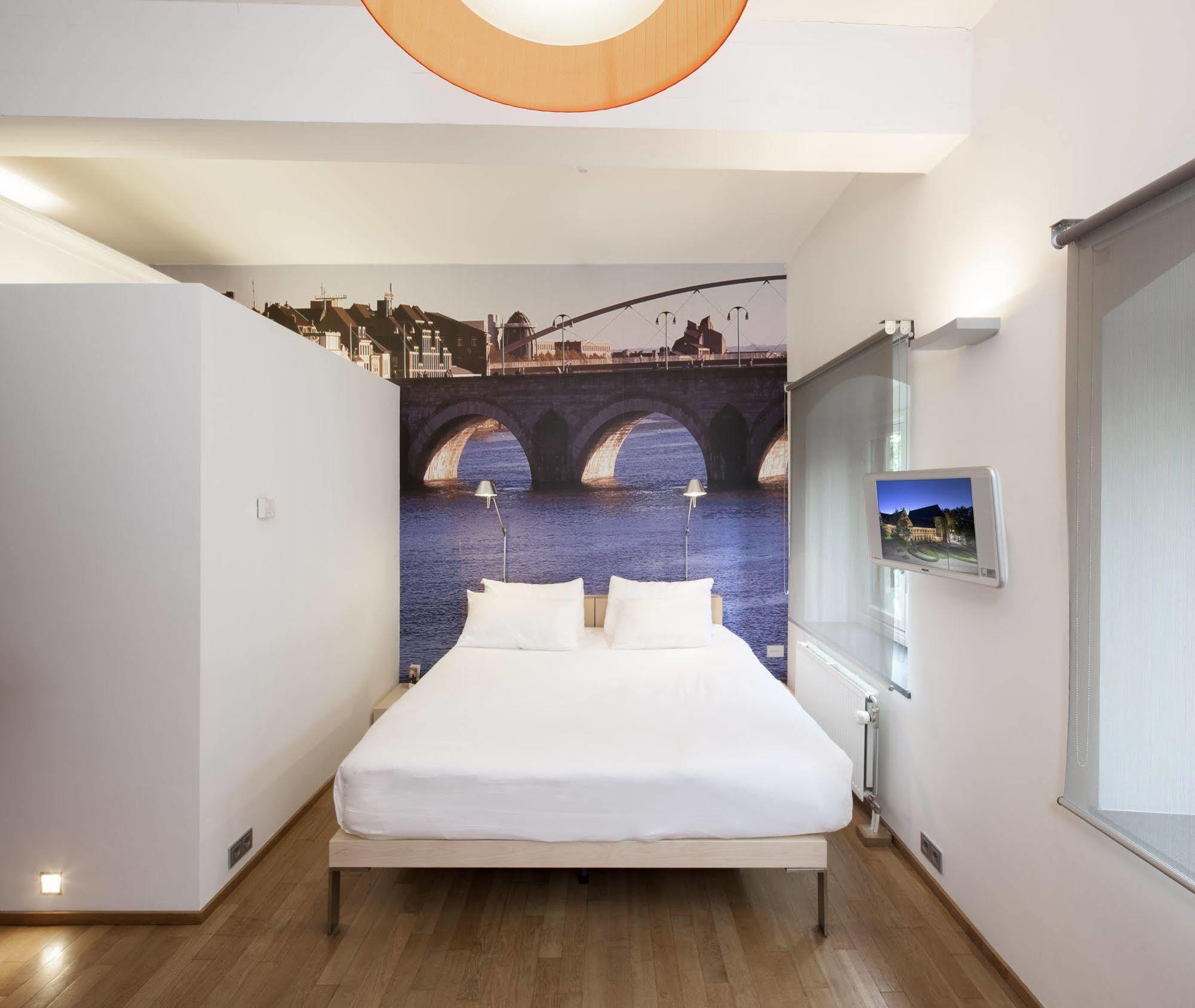 Kruisherenhotel Maastricht - Oostwegel Collection, Member Of Design Hotels Ngoại thất bức ảnh A room at the hotel